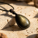Pendentif Goutte “Force Intérieure” en Obsidienne Dorée