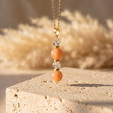 Pendentif "Aube Claire" en Pierre de Soleil et Cristal de Roche