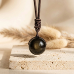 Pendentif "Sphère" en Obsidienne Dorée