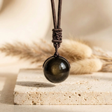 Pendentif "Sphère" en Obsidienne Dorée