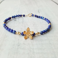 Bracelet "Bleu Sacré" en Lapis Lazuli & Fleur Dorée -  - L'Arbre des Chakras