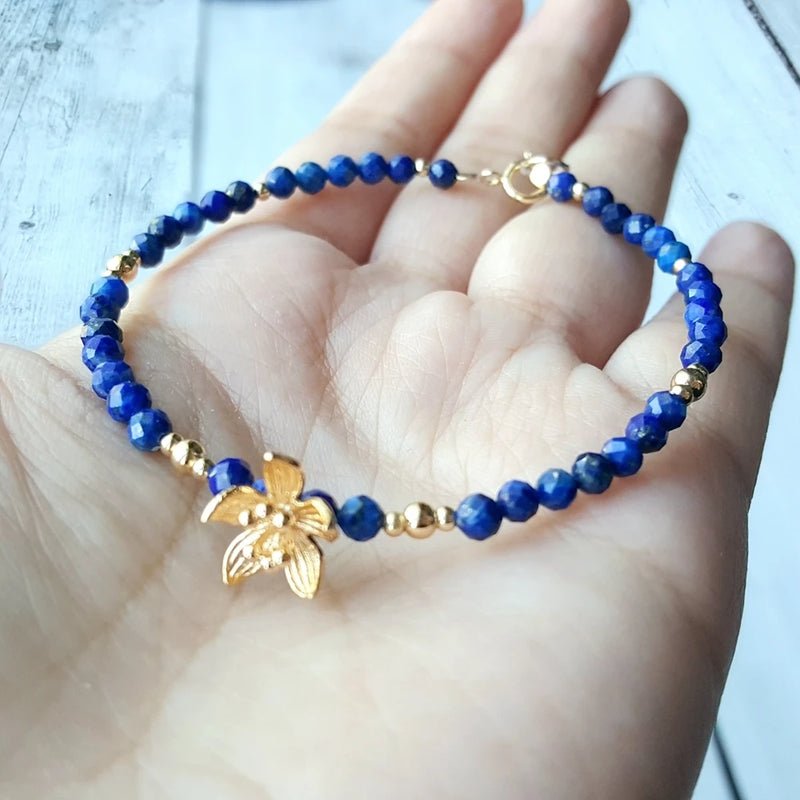 Bracelet "Bleu Sacré" en Lapis Lazuli & Fleur Dorée -  - L'Arbre des Chakras