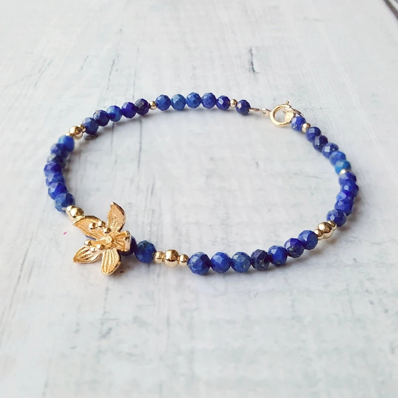 Bracelet "Bleu Sacré" en Lapis Lazuli & Fleur Dorée -  - L'Arbre des Chakras