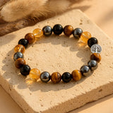 Bracelet "Force & Lumière" en Oeil de Tigre, Citrine, Hématite & Obsidienne - 17cm - L'Arbre des Chakras