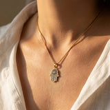 Pendentif "Lumière & Protection" Hamsa Dorée