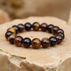 Bracelet "Réussite & Protection" en Oeil de Tigre, Grenat, Tourmaline & Quartz Fumé -  - L'Arbre des Chakras