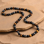 Collier "3 Protections" en Hématite, Obsidienne & Oeil de Tigre - 6mm / 55cm - L'Arbre des Chakras