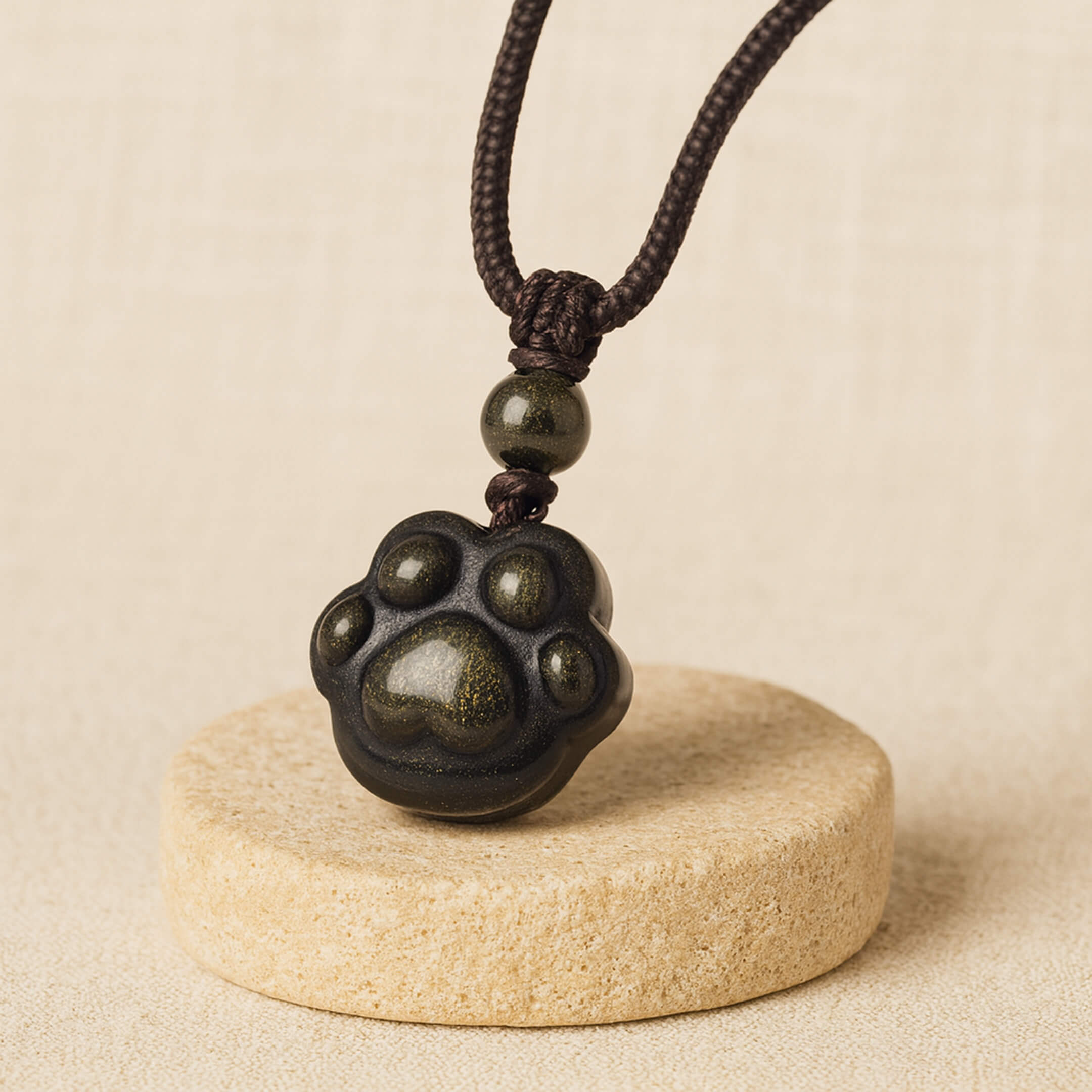 Pendentif Patte "Lien Éternel" en Obsidienne Dorée - - L'Arbre des Chakras