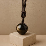Pendentif "Sphère" en Obsidienne Dorée - - L'Arbre des Chakras